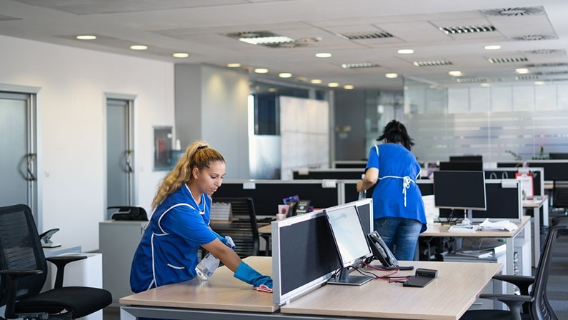 Cleaners clean empty office space photo