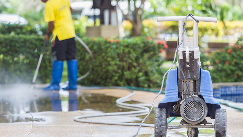 Outdoor floor cleaning with high pressure water jet
