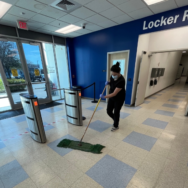 Day porter team member cleaning all day